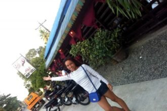 girl outside halo-halo restaurant near Misamis Occidental