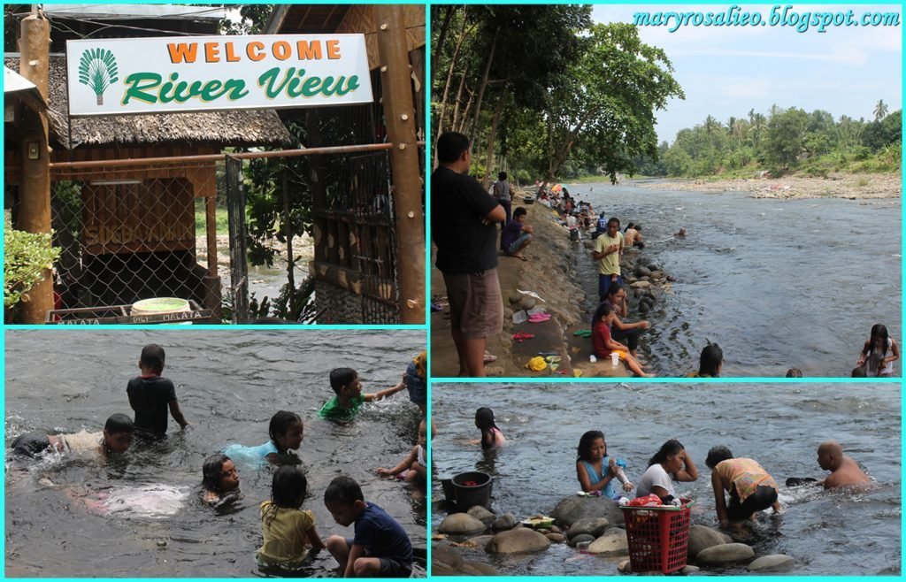 children bathing in river for travels in Misamis Occidental