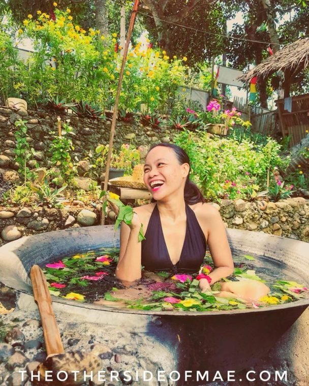 Misamis Occidental tourism guide smiling candidly while bathing in Kawa