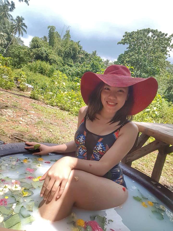 Misamis Occidental tourism guide poses for milk bath in kawa