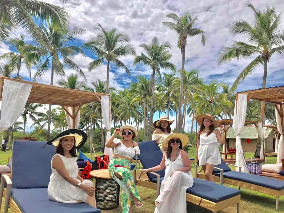 girls in brim hats and white dress in misamis occidental white island