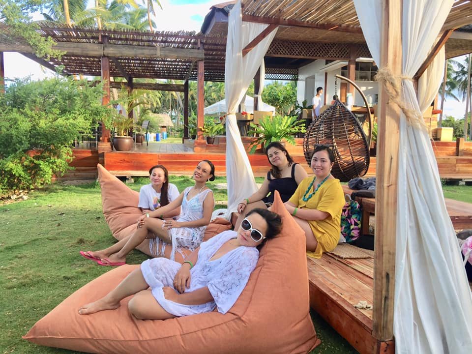 girl friends chilling by the beach in misamis occidental white island