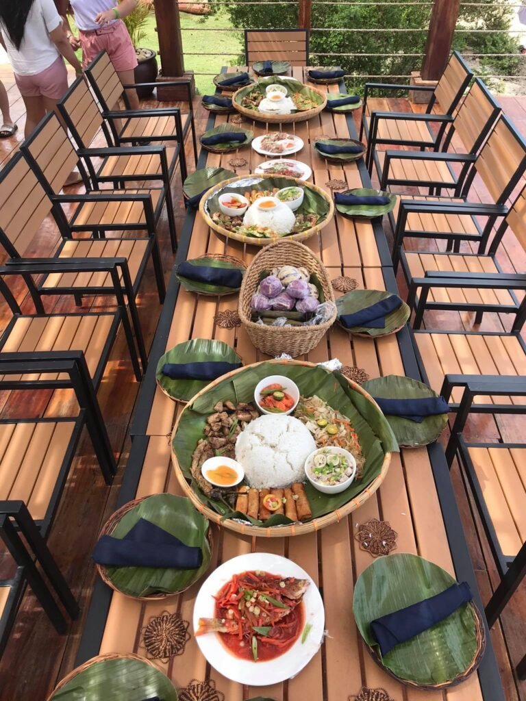 Filipino native food in bilao in misamis occidental white island