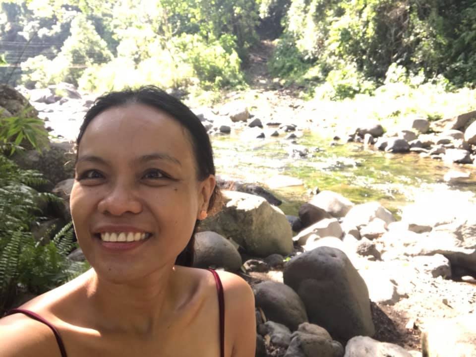 lady bathing in Misamis Occidental rivers