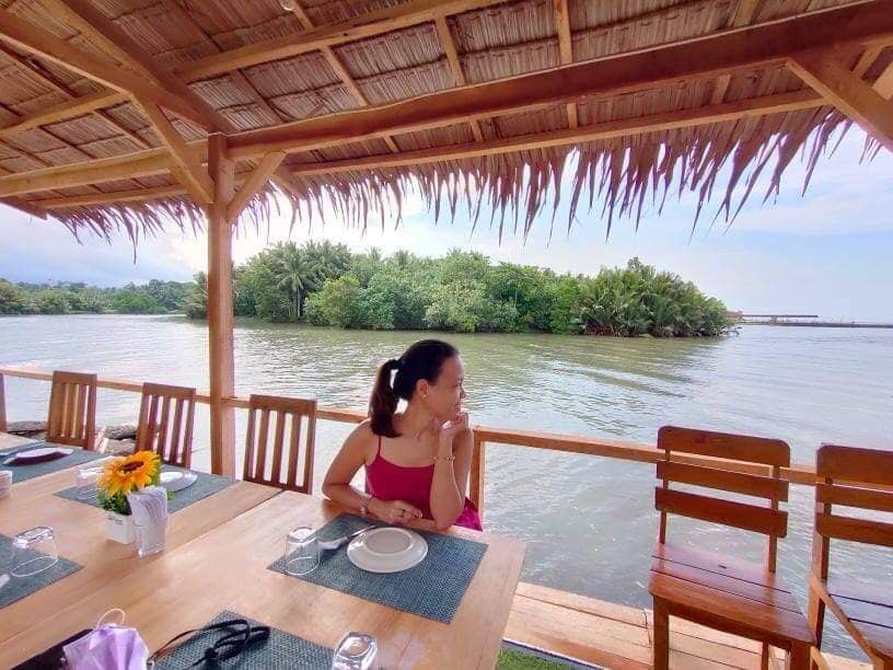 lady meditating in the river for Misamis Occidental best food