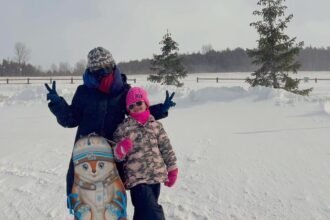 mother and child in ontario tourist attraction winter