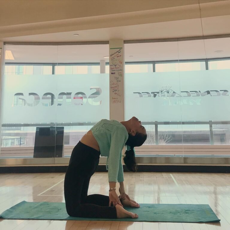 girl in camel yoga pose dancing in winter season