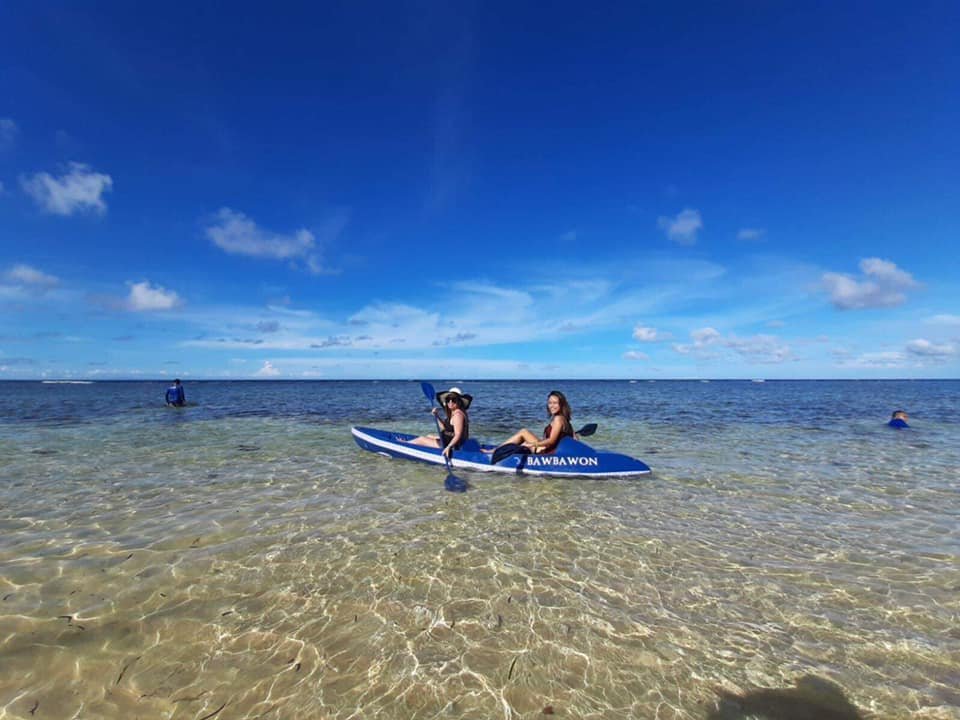 two girls kayaking at one of the beaches in Misamis Occidental